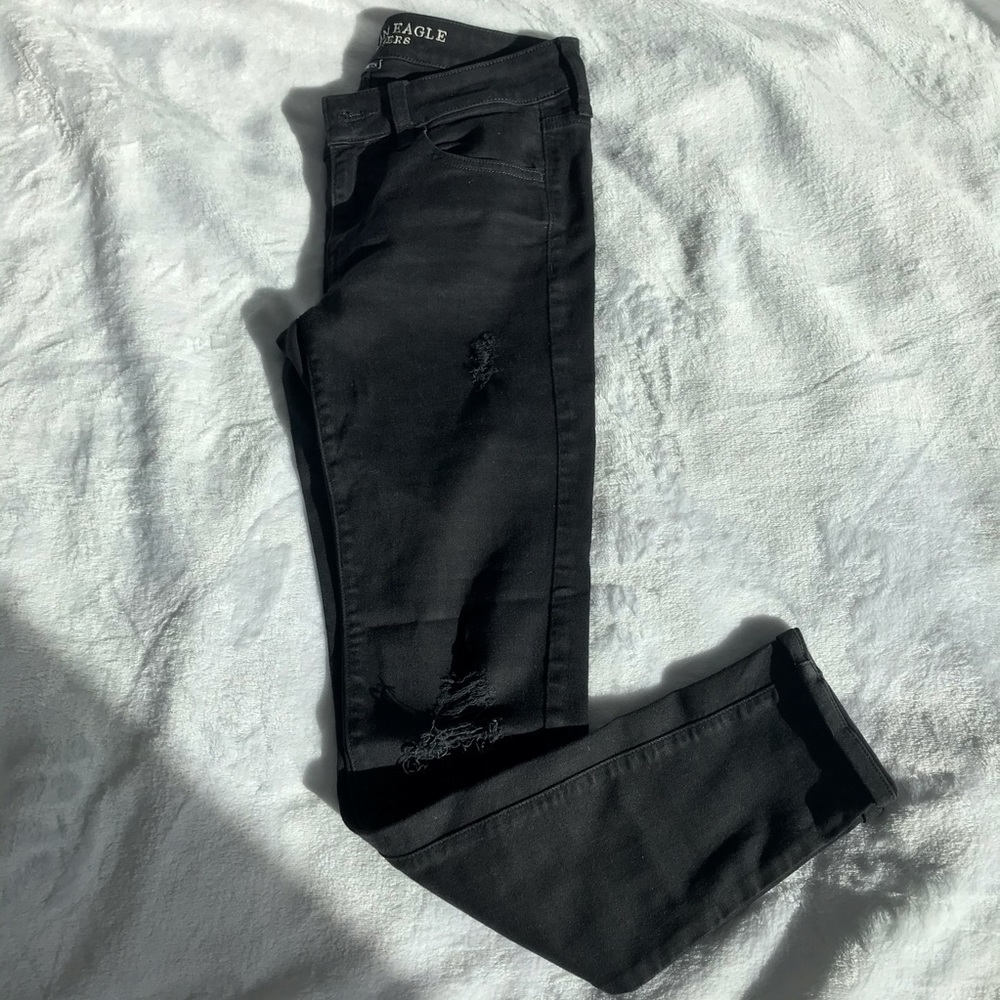 black ripped jeans